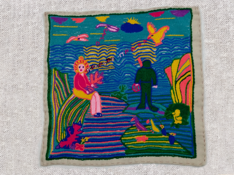 Obra textil de paisaje patrimonial bordado en lana de colores