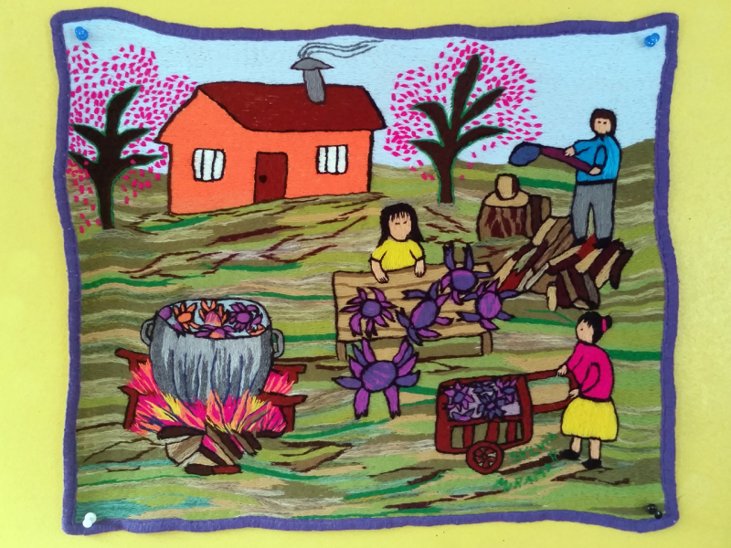 Obra textil de paisaje patrimonial bordado en lana de colores