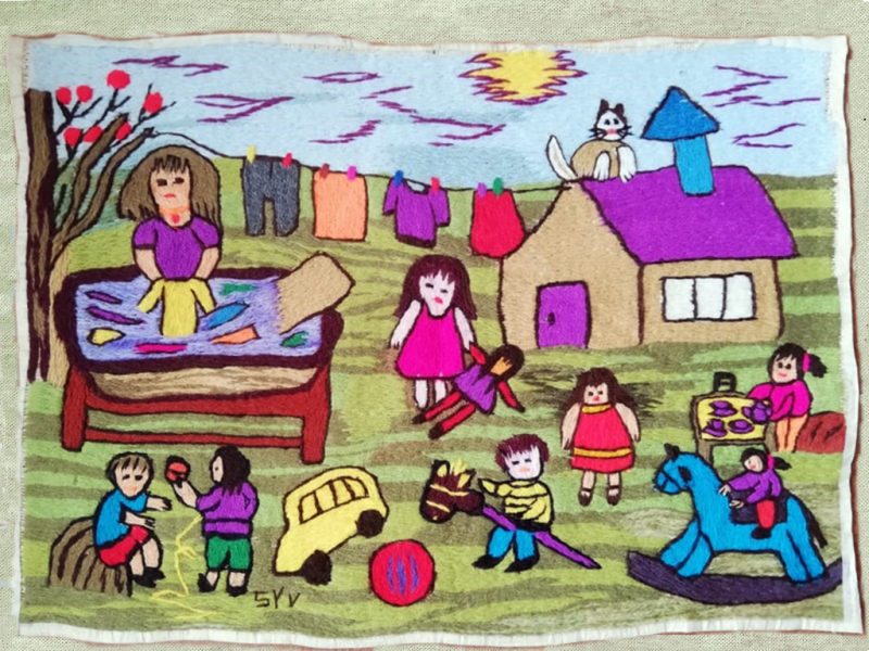 Obra textil de paisaje patrimonial bordado en lana de colores