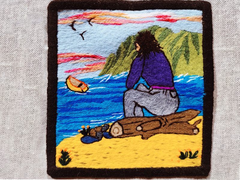 Obra textil de paisaje patrimonial bordado en lana de colores